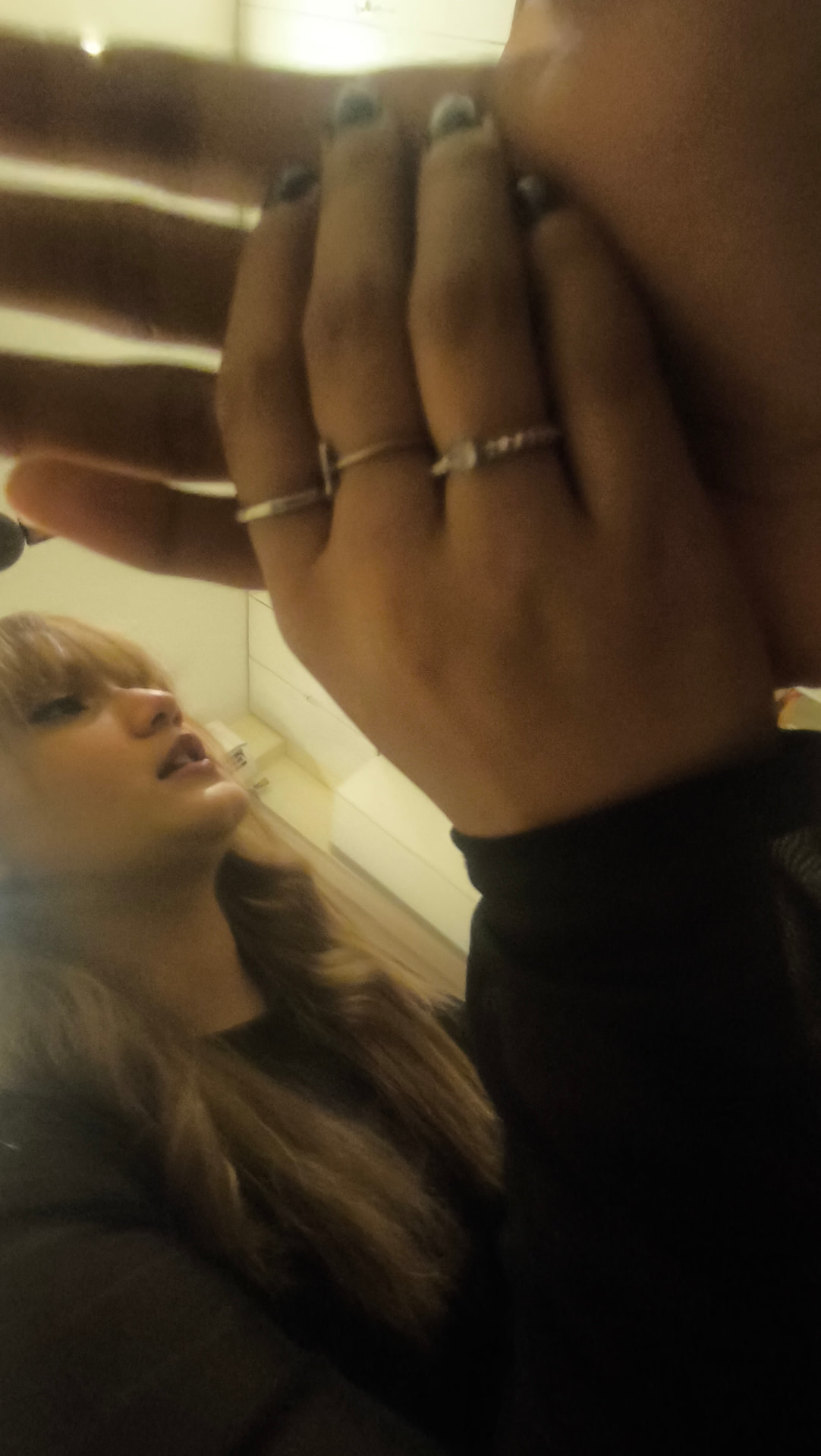 Close-up of Richa showing her ring stack